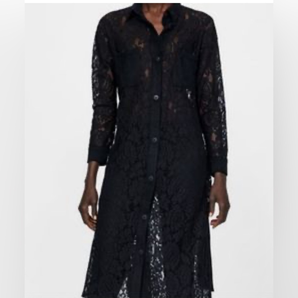 Zara’s Black lace blouse that can be worn with jeans, shorts or over a dress